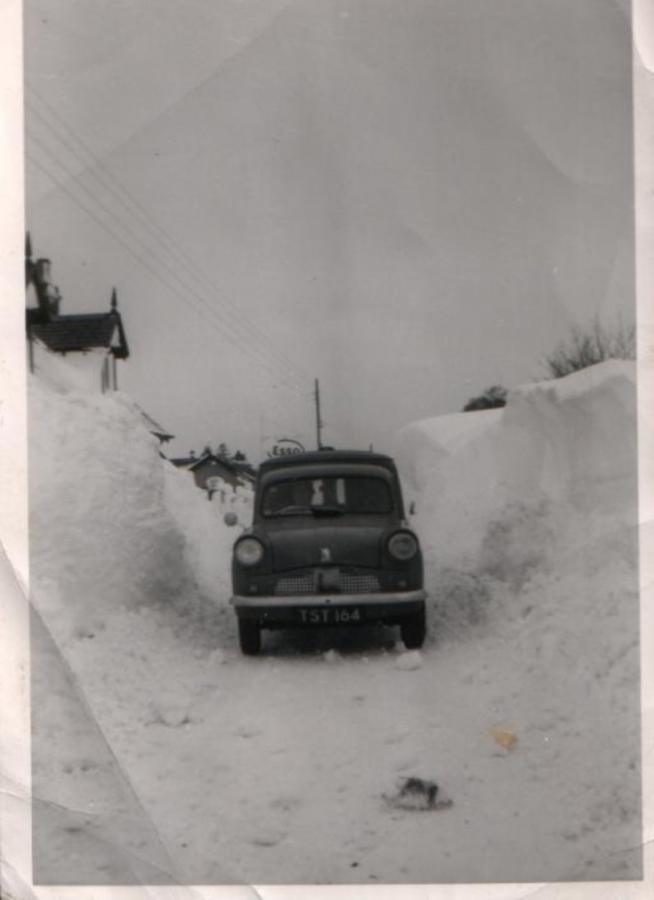 Car by Esso sign c1940s?