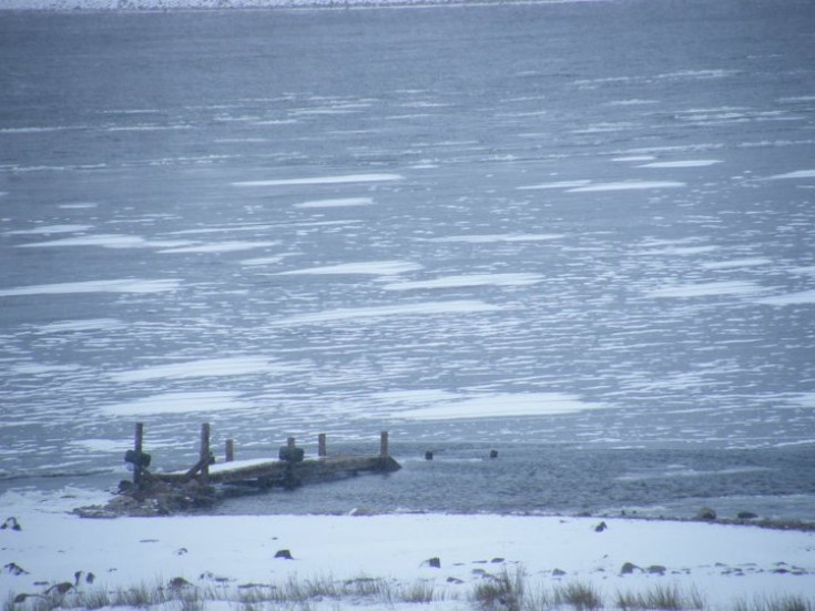 Loch Ericht frozen at Ben Alder pier