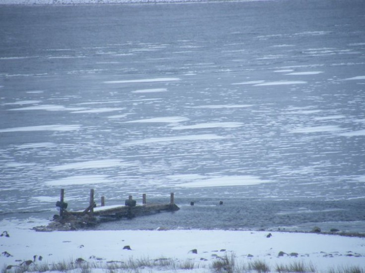 Loch Ericht frozen at Ben Alder pier