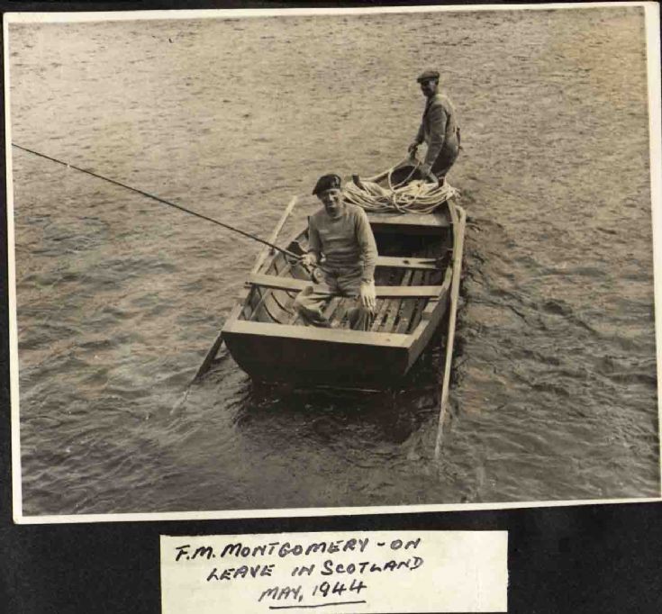 Monty with a fishing ghillie on Loch Insh