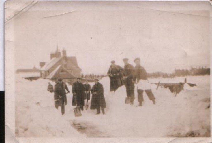 Clearing snow outside Grampian View